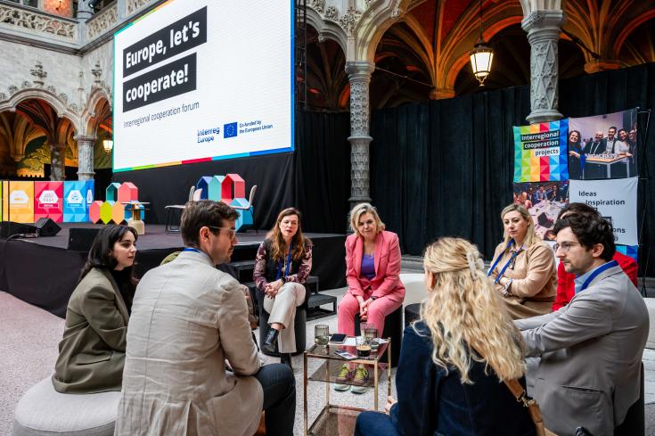People sitting in a circle networking