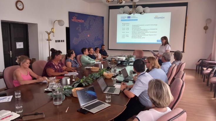 Regional Stakeholder Group meeting in Veszprem Hungary Regional Stakeholder Group meeting in Veszprem Hungary. Group of people sitting at table watching presentation