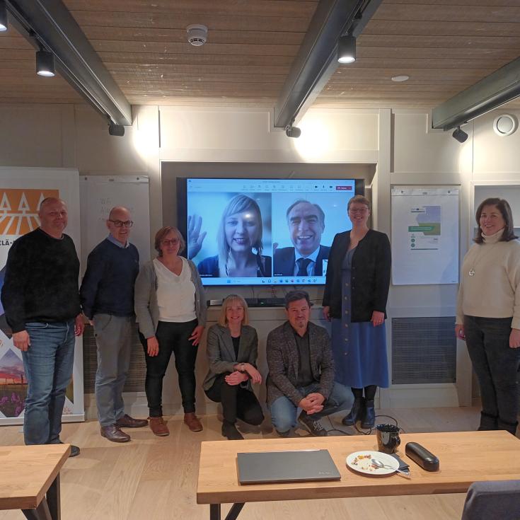CODIL Interregional Knowledge Transfer Event Project partners gathered for a group photo in a meeting room