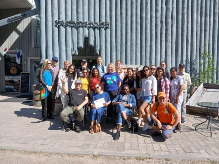 People meeting in front of museum
