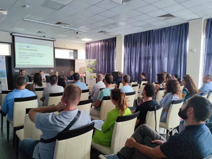 DETOCS Stakeholders Group in Burgas, Bulgaria, First Meeting Picture shows a group of numerous people sitting in a large room for a presentation and stakeholder meeting.
