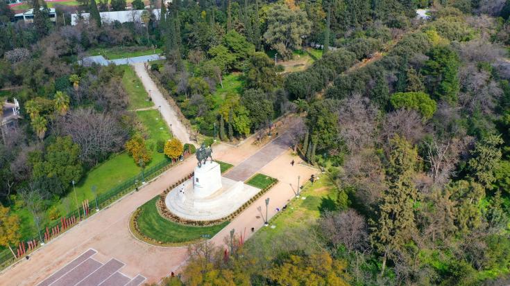 Green area Attica Statue amongst green surroundings