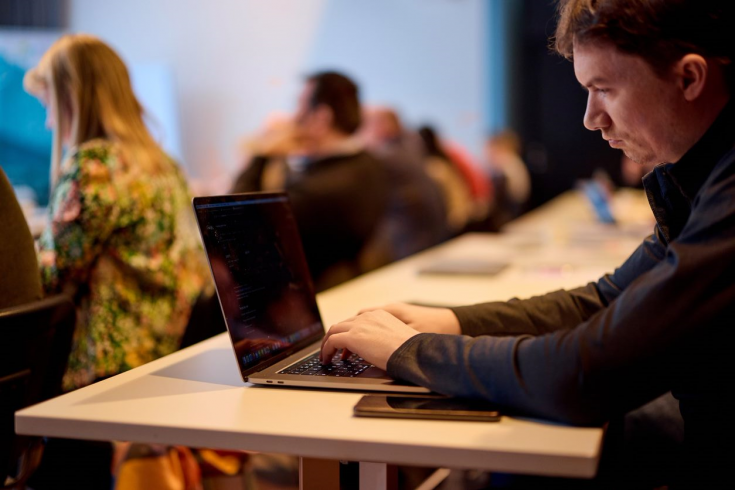 Person typing on a laptop