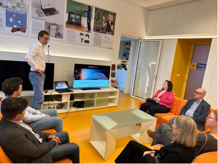 Site visit in Slovenia A lecturer presenting multimedia projects