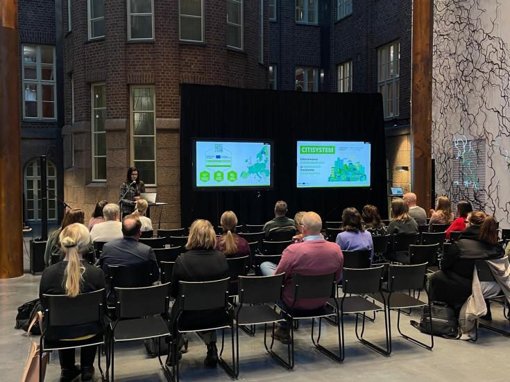 Picture of audience following the lecture