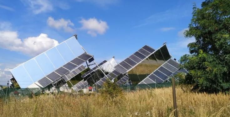 Solar panels located in a field Solar panels in a field