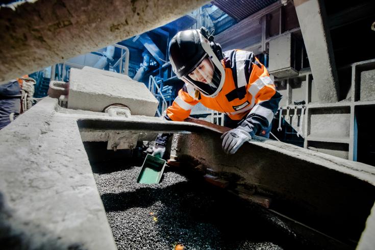 Woman working in Tornio mills, Finland.