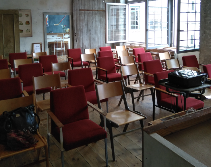 View of chairs in a room View of chairs in a room