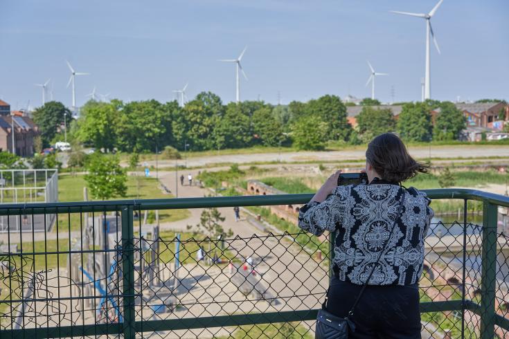 Woman looking at green district