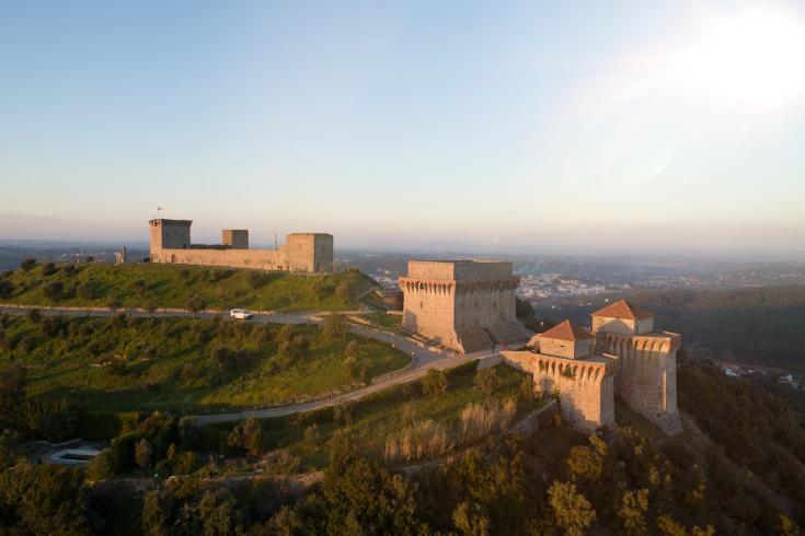 A panoramic view with a castle on the hill