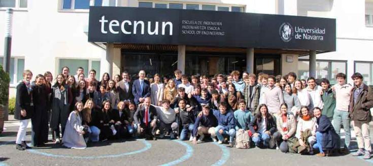 Group of people in front of the tecnun university sign