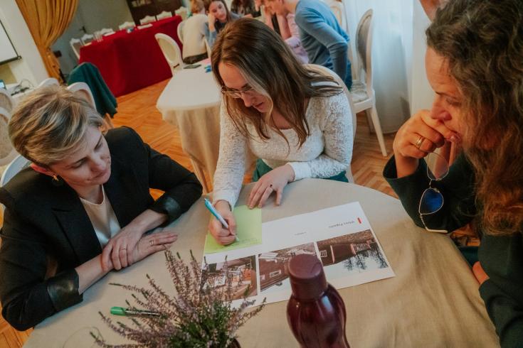 A group of stakeholders sitting around a table