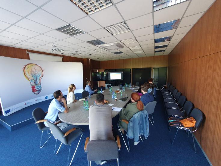 Stakeholders speaking about RECs at a round table