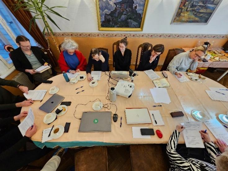 Stakeholder meeting #2 Tallinn a group of stakeholders around a table