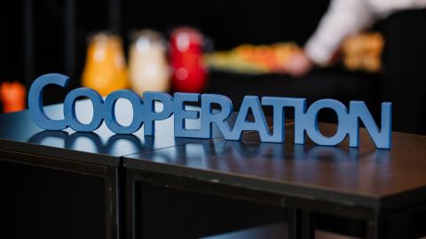 Cooperation