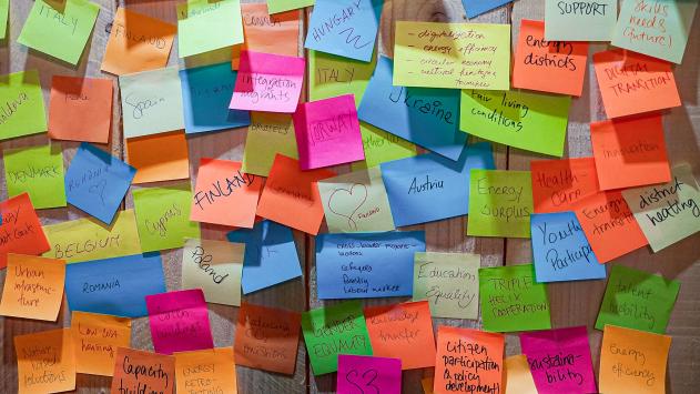 The 21st European Week of Regions and Cities - 9-12 October 2023 colourful post-it notes with text on the notes