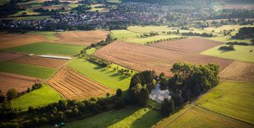 The village Londorf in Germany, district Gießen. With agricultural parts, forest and a energy plant