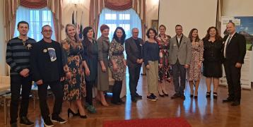 Group photo in a manor house salon