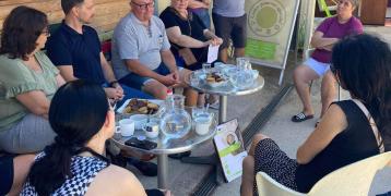 Participants of stakeholder meeting in CPU Slovenske Konjice sitting around a table