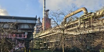 Duisburg steel plant A steel plant with trees in the foreground