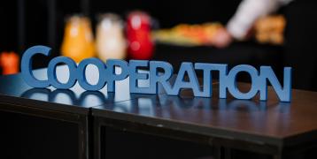 Cooperation