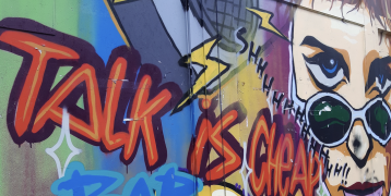 Colourful grafitti on street wall