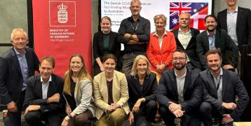 A group photo of the Danish delegation in the office of the Danish Trade Council