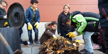 school pupils composting biowaste
