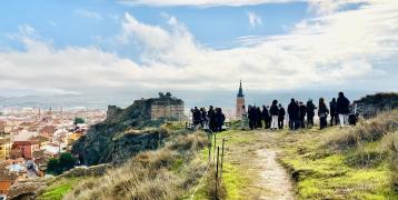 People visiting religious rural heritage