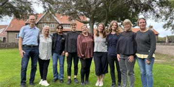 Group photo of people in a park