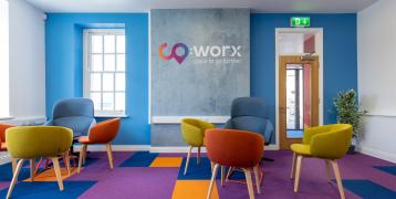 Reception and lounge area of co:worx