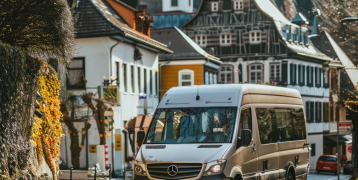 Mini bus driving in a town