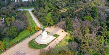 Statue amongst green surroundings