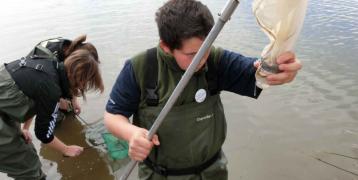 People sampling rivers
