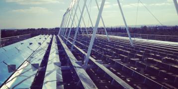 Solar energy panels on top of a building