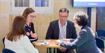 People network around a table at Project partner event - 2017
