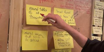 RPSO Policy Action Lab Board with post its and a hand writing on them