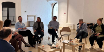 On this picture, you can see the local partners during a meeting.