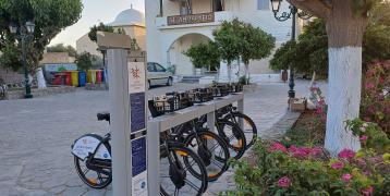 Shared bikes in Psara island New shared bike system in front of the City Hall of the Municipality of Psara in North Aegean Region, Greece
