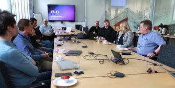A meeting, people talking around a table (stakeholder Group meeting)