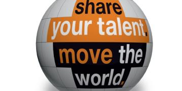 Text on a globe or ball: share your talent. move the world