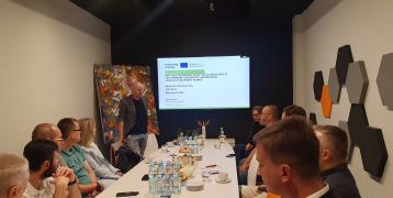 Polish stakeholder group meeting in a room