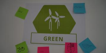 the thematic objective green printed out with descriptive sticky notes