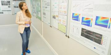 Woman looking at wall of information