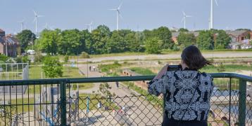 Woman looking at green district