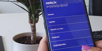 The picture shows usage the eService website on a smartphone, making the services more accessible to citizens of Cēsis District Municipality