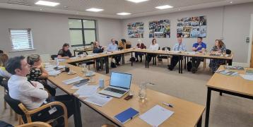 People sitting in a meeting room
