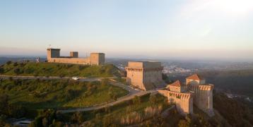 A panoramic view with a castle on the hill