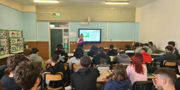 Students from Lucca high school listen to Greta