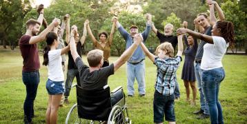 A group of diverse people doing a group activity